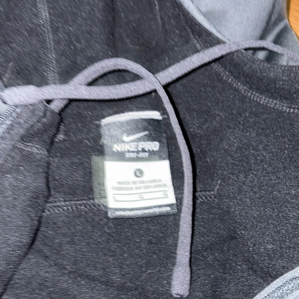 Nike Pro Dri-Fit pull over. Great for running this winter size large